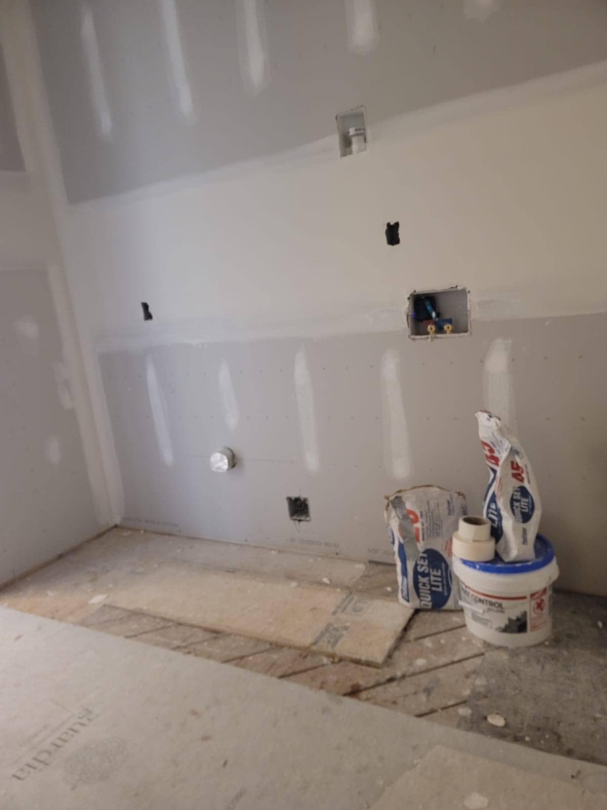 Low Level Plasterboard Rips Plaster Repair - Level7 Construction